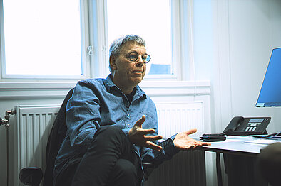 Patrik Fridlund with an opinion, in his office.