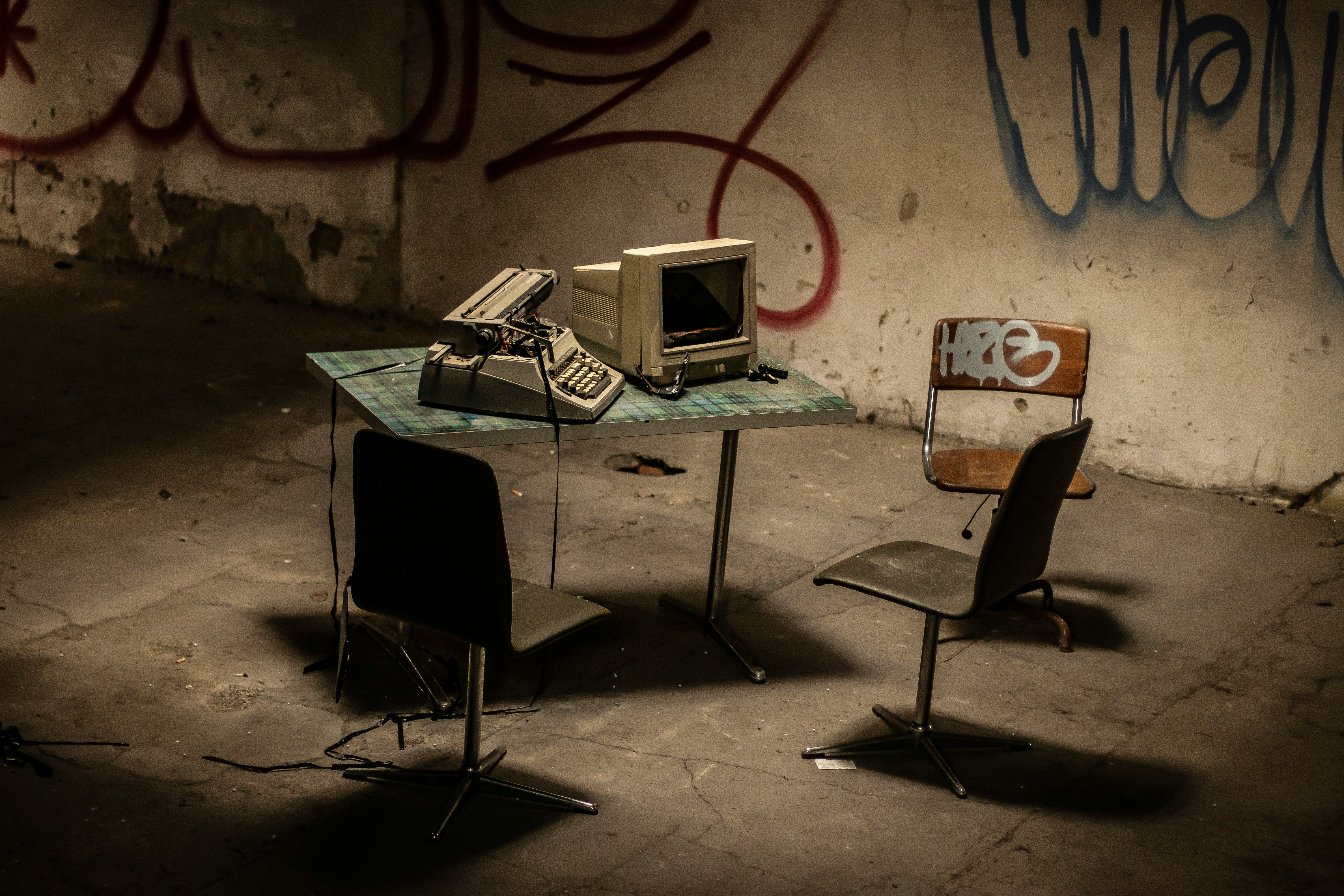 Photo of desk and computer in distressed area